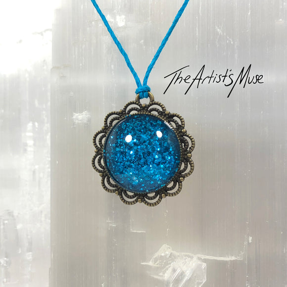 Pendant Necklace- Bright turquoise glitter resin with glass dome finish