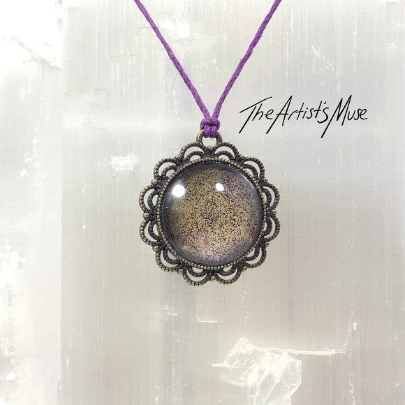 Pendant Necklace- antique gold background with dark purple glitter resin with glass dome finish