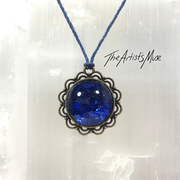 Pendant Necklace- Deep blue glitter resin with glass dome finish