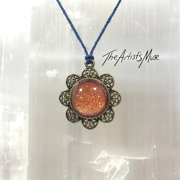 Pendant Necklace- burnt orange glitter resin with glass dome finish