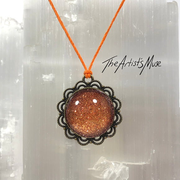 Pendant Necklace- Burnt orange glitter resin with glass dome finish
