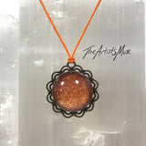 Pendant Necklace- Burnt orange glitter resin with glass dome finish