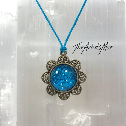 Pendant Necklace- Bright turquoise glitter resin with glass dome finish