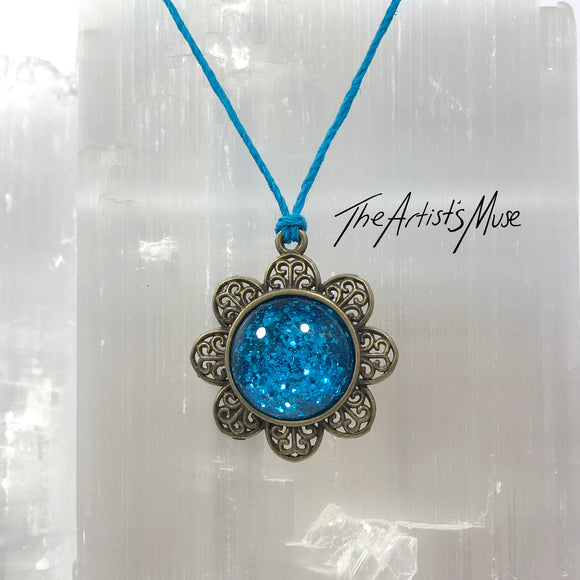 Pendant Necklace- Bright turquoise glitter resin with glass dome finish