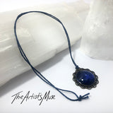Pendant Necklace- Deep blue glitter resin with glass dome finish